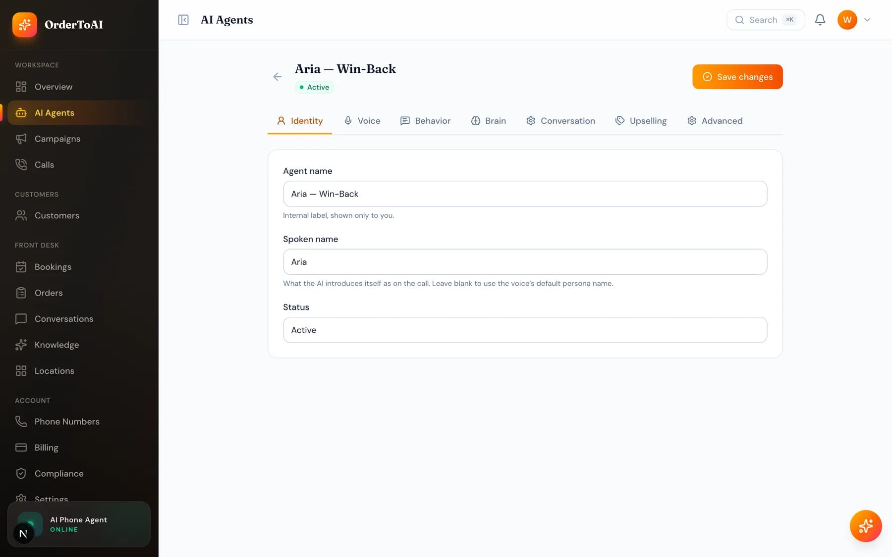 The Identity tab of the agent editor with agent name, spoken name, and status fields